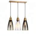 Three bulb pendant light with colored glass shades and metal accents 40 x 15 x 15cm