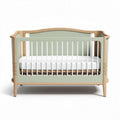 Wooden baby crib with green accents and white mattress 130 x 70 x 90cm